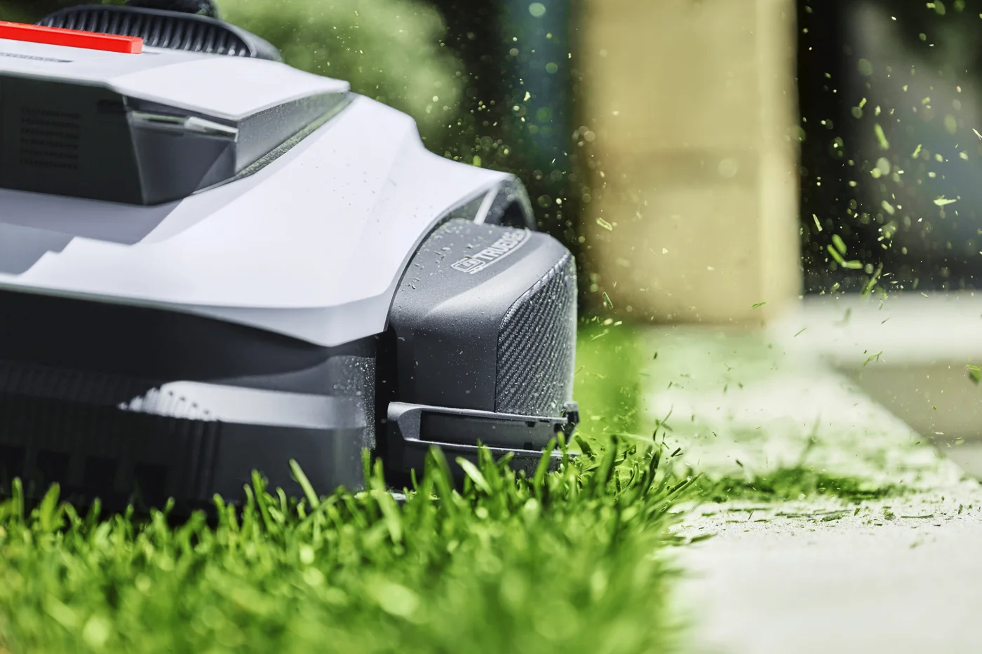 GOAT robotic lawn mower cutting grass